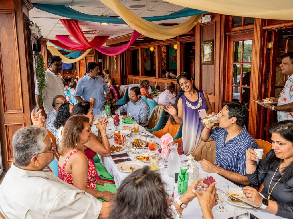 Large family enjoying a meal